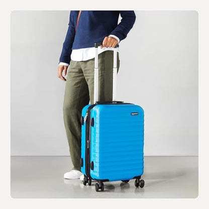 Amazon Basics 21" Hardside Carry-On Luggage, Hardshell Suitcase With Wheels, Expandable For Up to 25% More Space, With Scratch-Resistant Surface, Four Multi-directional Wheels, Light Blue